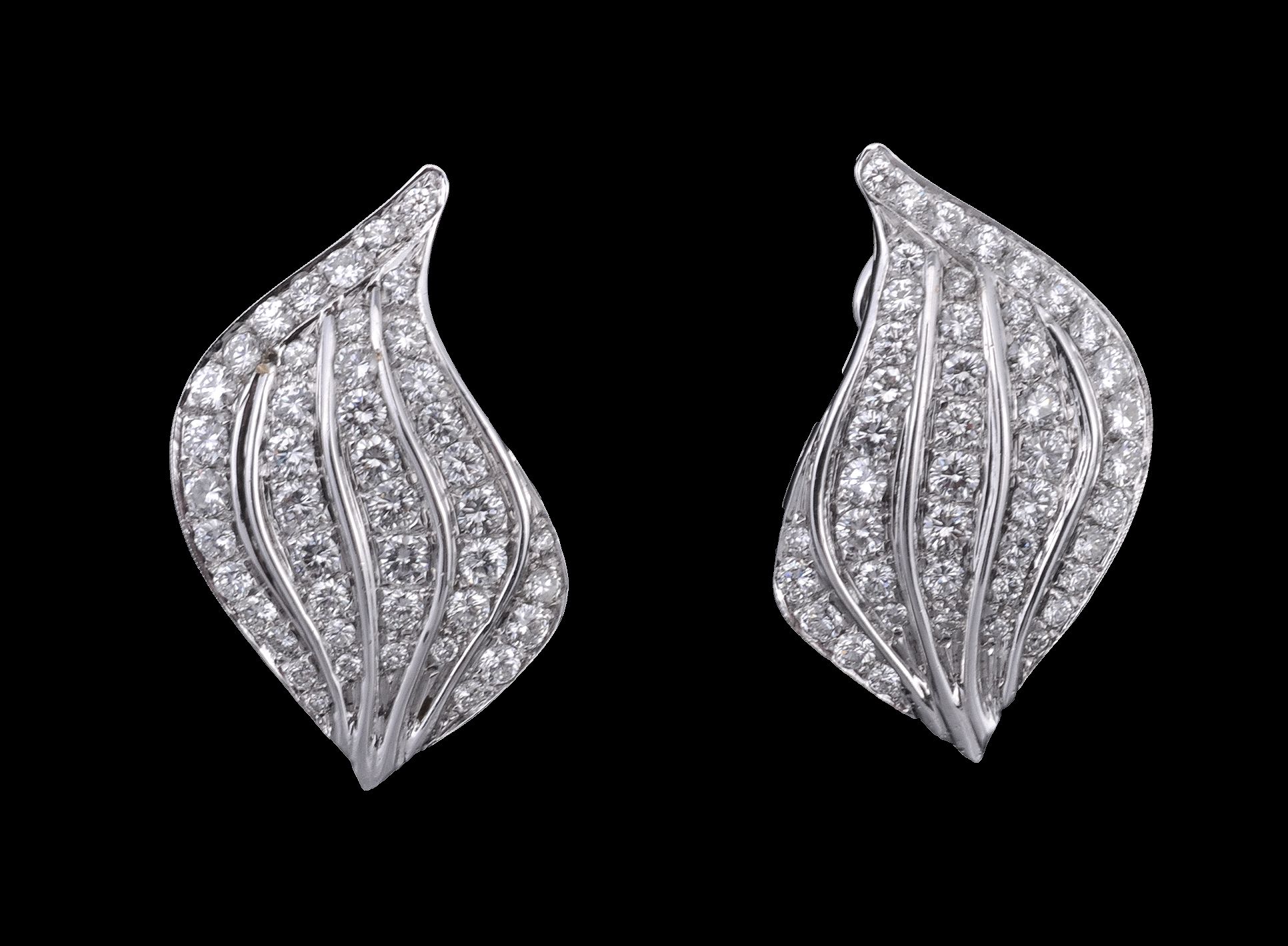 A pair of diamond ear clips, the leaf shape ear clips set throughout with...  A pair of diamond