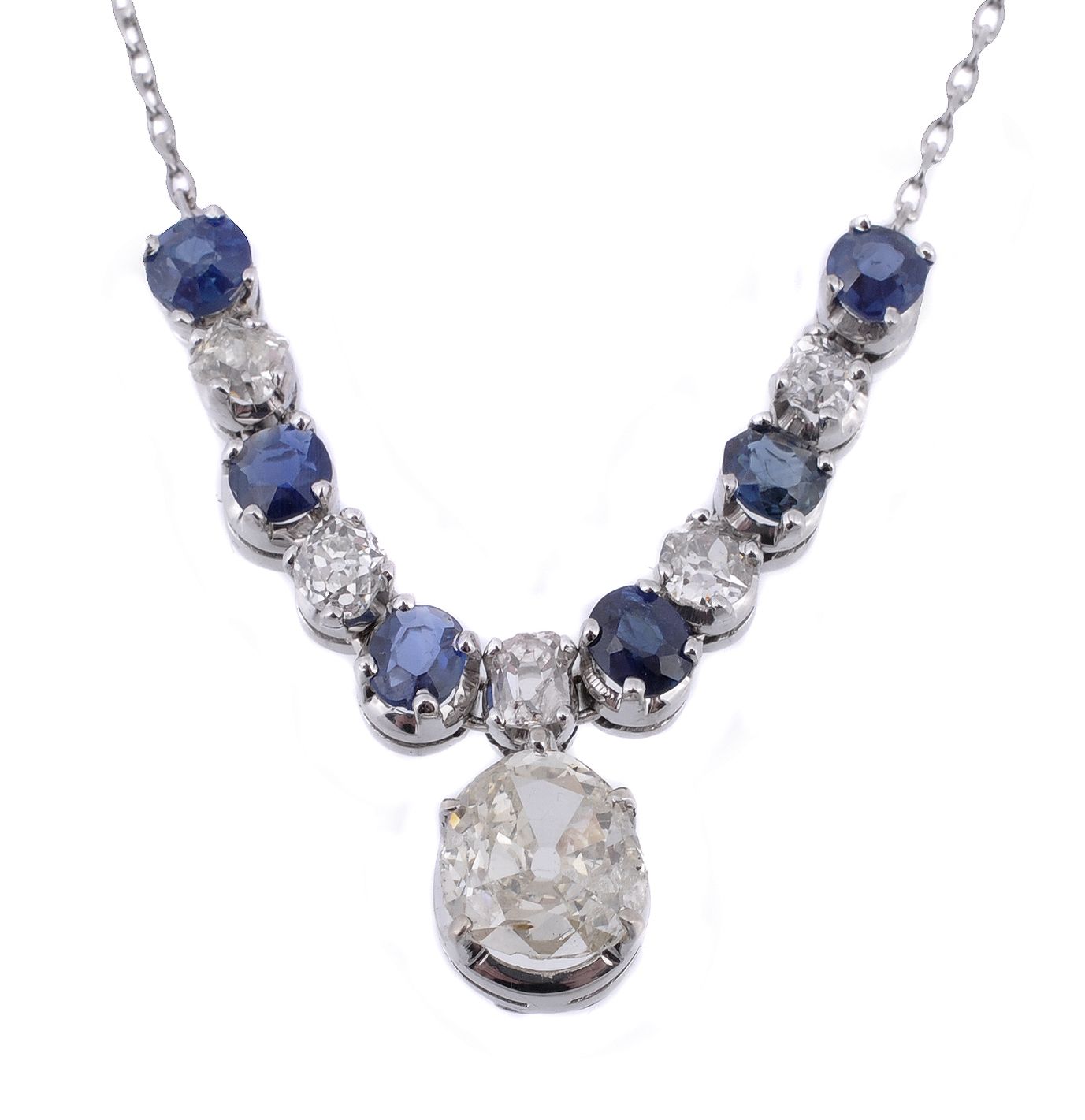 A diamond and sapphire necklace , the front section with alternating oval...  A diamond and sapphire