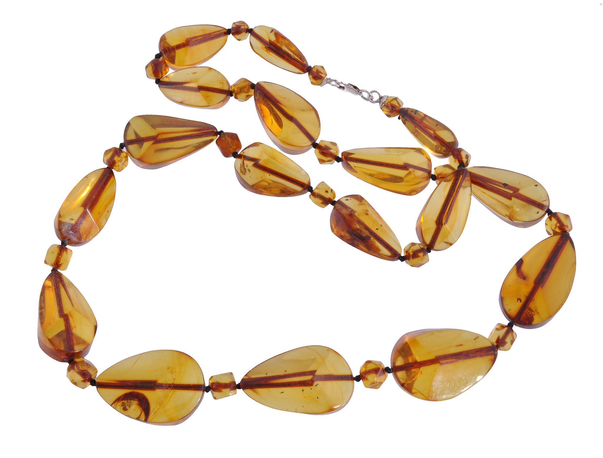 A single strand of amber beads, composed of seventeen graduated facetted...  A single strand of
