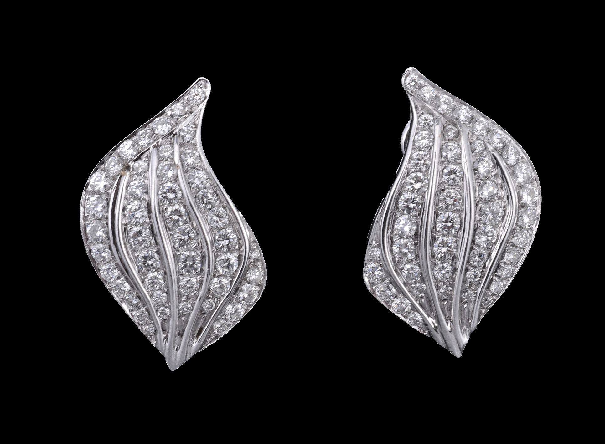 A pair of diamond ear clips, the leaf shape ear clips set throughout with...  A pair of diamond ear