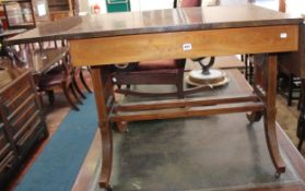 A Sheraton Revival style mahogany sofa table with swag decoration to the frieze.