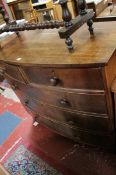 A Georgian mahogany bow front chest drawers with two short drawers and three long.