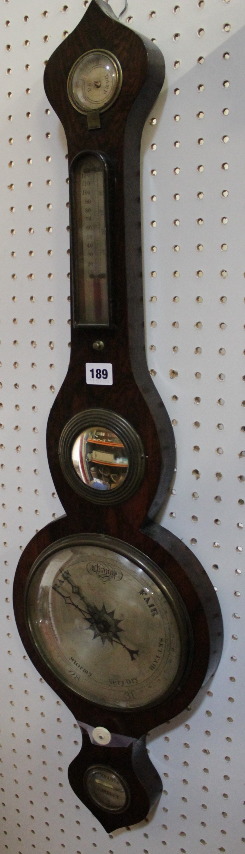 A Victorian rosewood mercury wheel barometer, mid 19th century, the eight inch star-centred