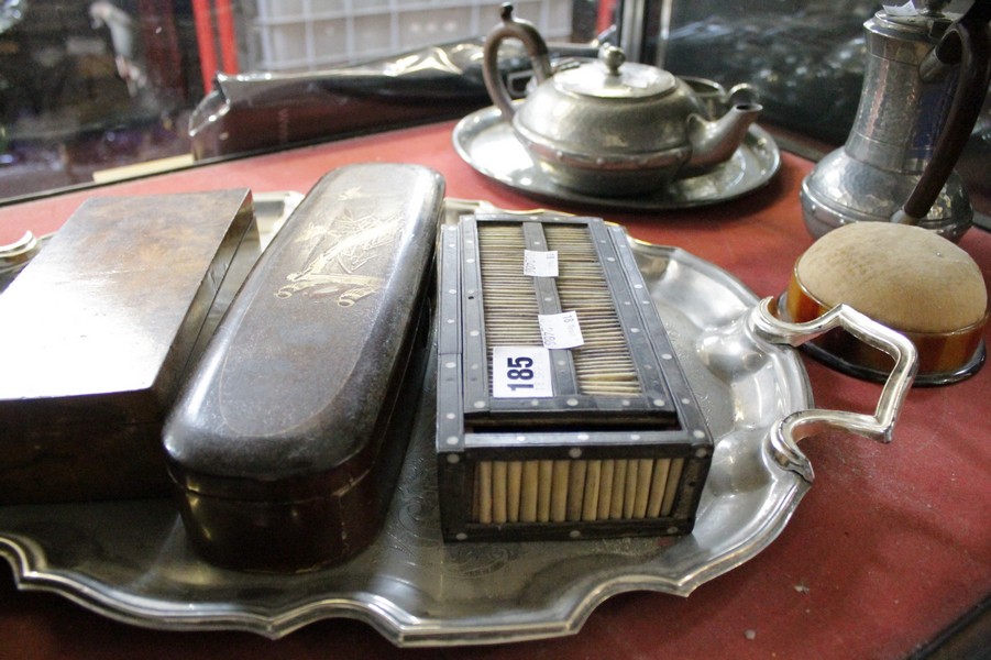 A hammered pewter tea service, a porcupine quill box, a Japanese red lacquered brush box and