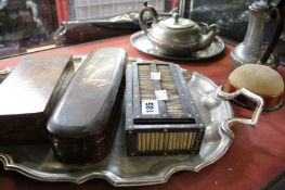 A hammered pewter tea service, a porcupine quill box, a Japanese red lacquered brush box and