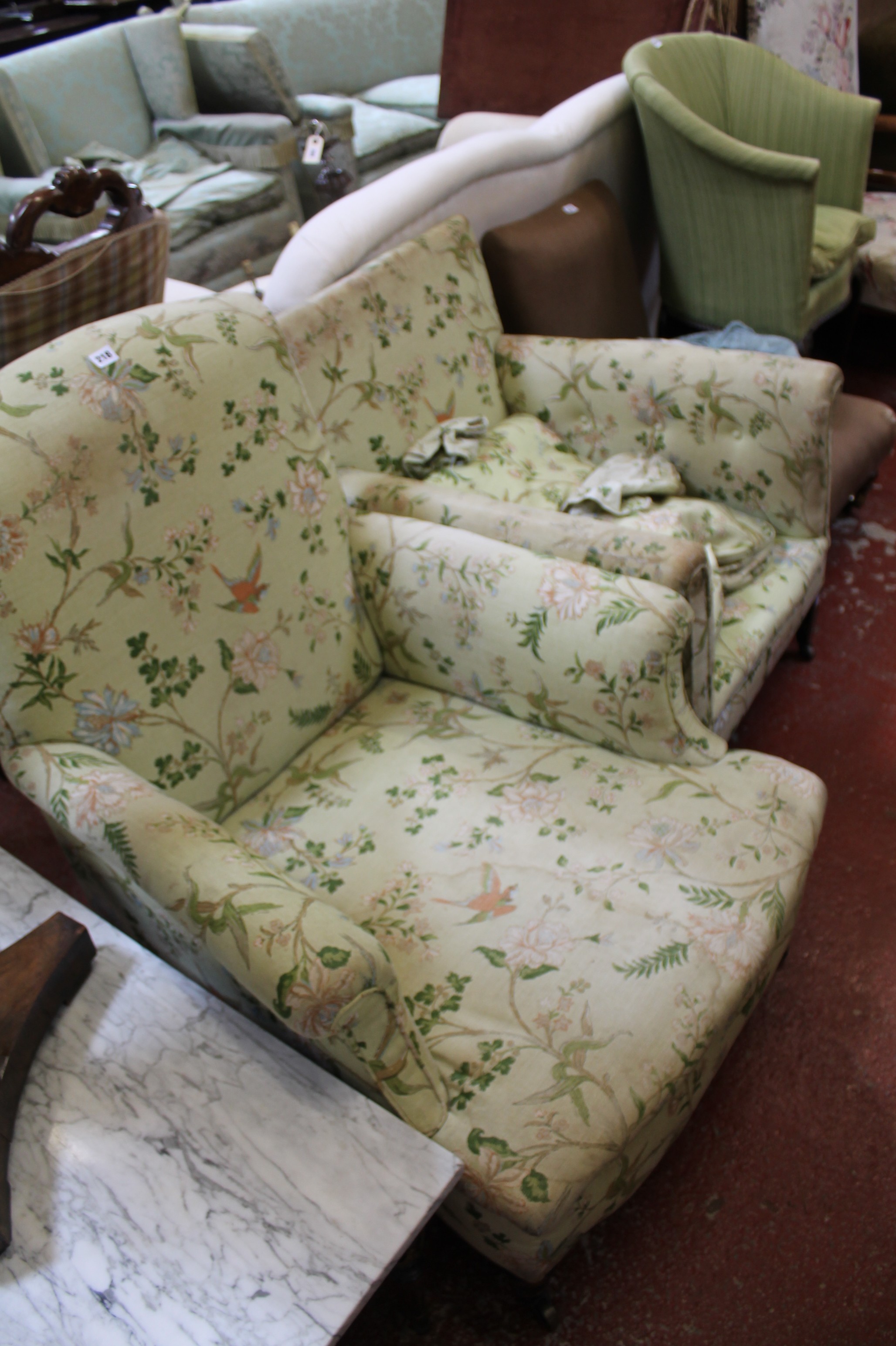 A Victorian upholstered armchair and another