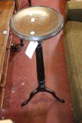 An Edwardian reeded torchere stand on tripod supports plus a Victorian low oak bookcase with glazed