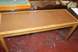 An oak framed serving table, plus a George III style mahogany serpentine sideboard with a frieze