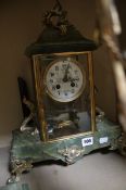 A French gilt metal mounted green onyx four-glass mantel clock, circa 1900, the eight-day gong