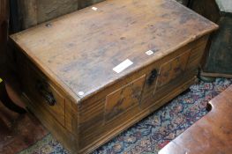 A 19th century continental pine storage chest with painted birds to the front panel.93cm wide,