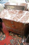 A 19th century continental kingwood commode with three drawers.