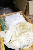 A mixed quantity of textiles to include predominately white household linens etc. Best Bid