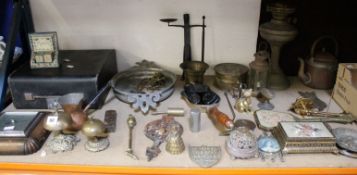 A large assortment of metalware including an extensive quantity of brass candlesticks etc. Best Bid