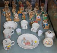 A Royal Doulton Bunnykins money box, Wedgwood Peter Rabbit items and a selection of various