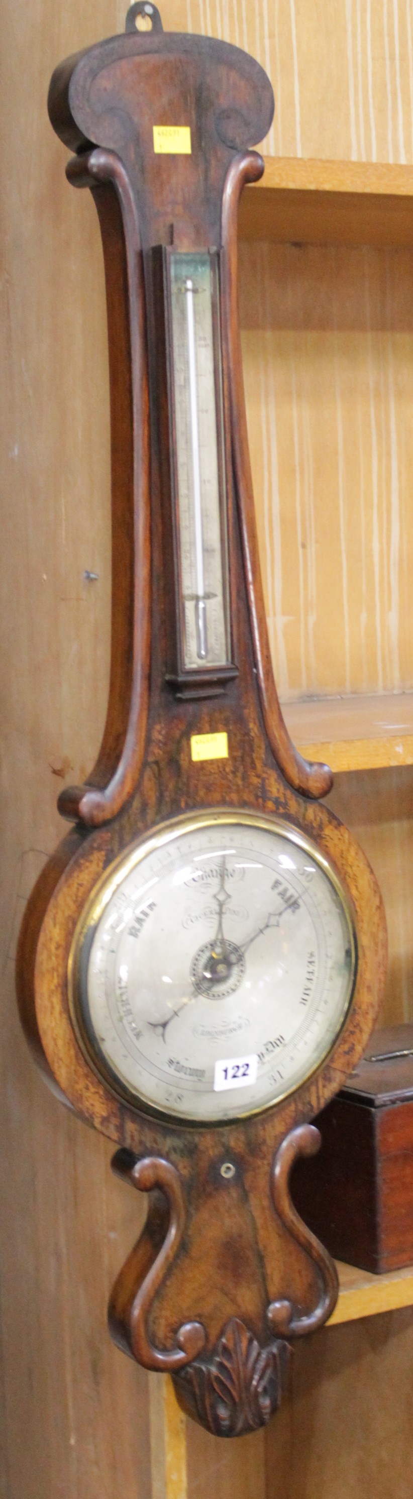 A Victorian rosewood mercury wheel barometer, mid 19th century, the eight-inch circular silvered