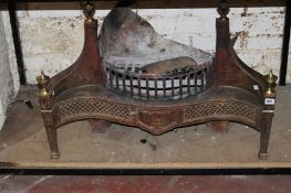 A 19th century steel fire basket of serpentine outline 84cm wide  Best Bid