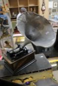An Edison Standard phonograph, horn and cylinders; and a Columbia wind-up portable gramophone and