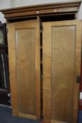 A Victorian satinwood double wardrobe with fitted interior, raised on plinth base. 212 x 142cm