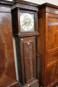 An oak eight-day longcase clock, early 18th century and later, the four (formerly five) finned
