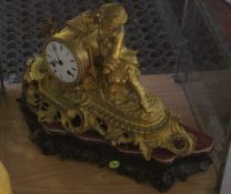 A French gilt metal figural mantel clock, late 19th century, the eight-day bell striking movement