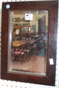 A rosewood framed small mirror with beaded framed edge 40 x 29cm Best Bid