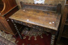 A Victorian walnut Sutherland table and a Victorian oak side table