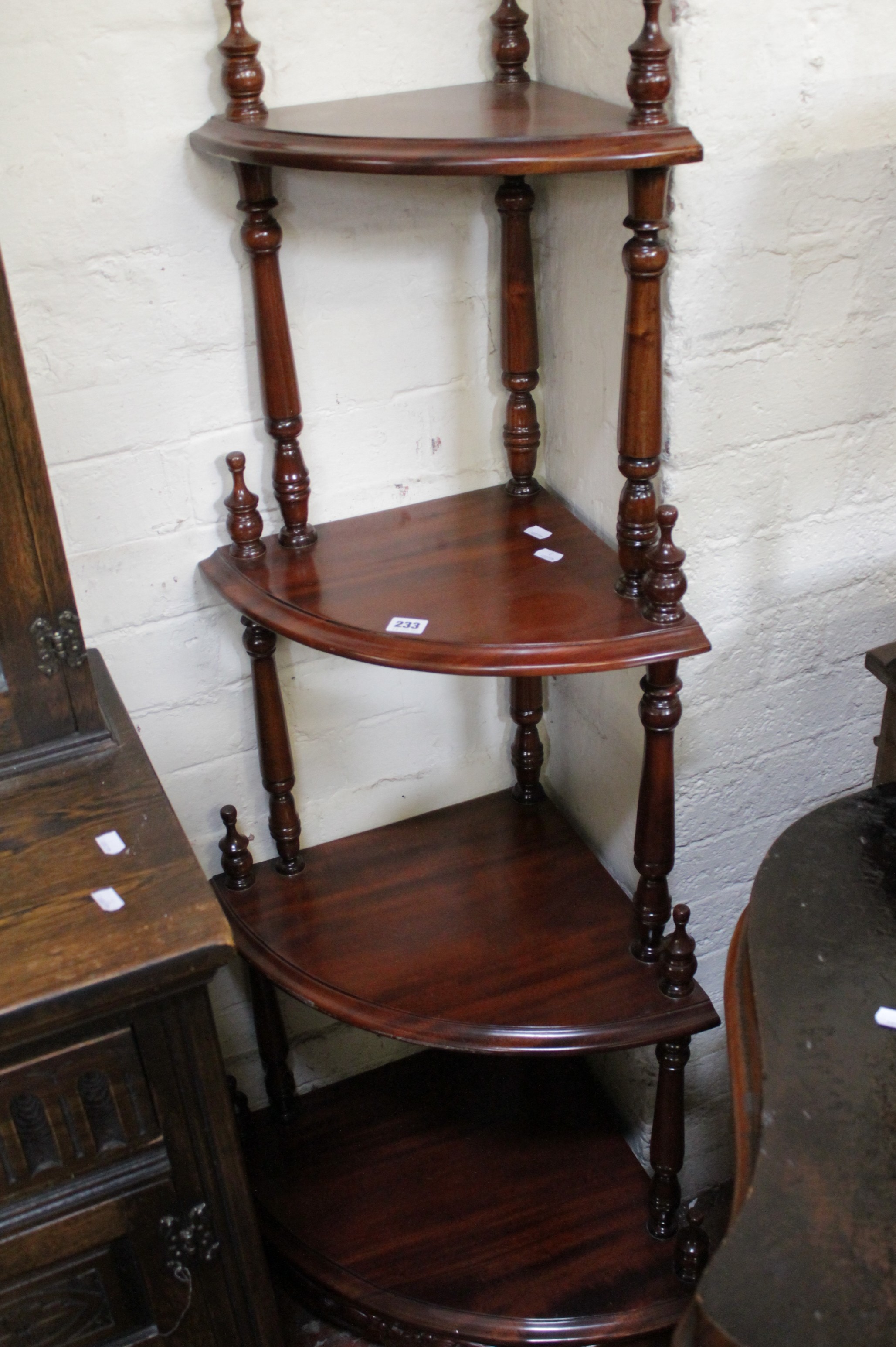 A mixed lot of mahogany occasional tables, torchere and a corner graduated whatnot  Best Bid