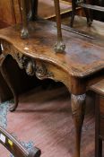 A 19th century Continental walnut bow-front side table with carved apron & cabriole legs, 108cm