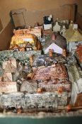 A selection of mixed porcelain models of cottages and a small quantity of ceramic figures etc. Best