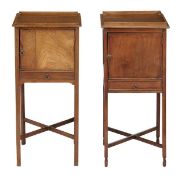 A matched pair of mahogany bedside cupboards, 19th century, each with a galleried top above a