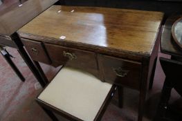 A three drawer kneehole desk/side table 93cm wide, a George III mahogany dressing table mirror and