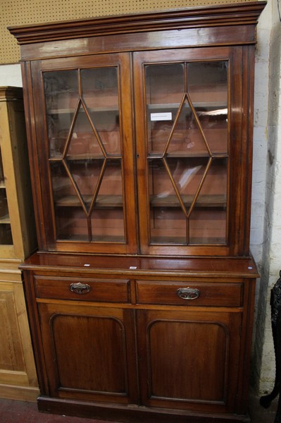 A late Victorian mahogany glazed bookcase 213cm high, 122cm wide  £150-250