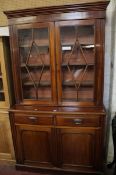 A late Victorian mahogany glazed bookcase 213cm high, 122cm wide  £150-250