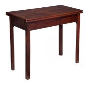 A George III mahogany folding tea table, circa 1800, the rectangular top opening to a plain