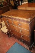 An oak chest of drawers, early 19th century with two over three drawers.