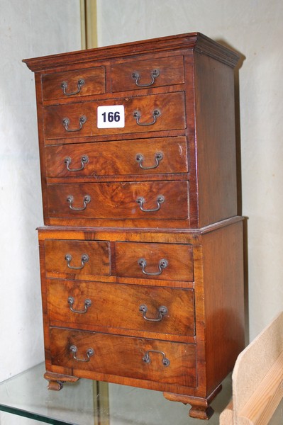 An 18th Century style walnut miniature tallboy chest, 20cm wide x 37cm high