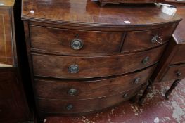 A 19th century mahogany bow front chest of drawers with two short over three long drawers.