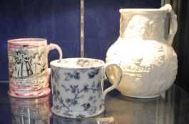A Victorian lustre tankard, a pottery ewer and a blue and white printed mug