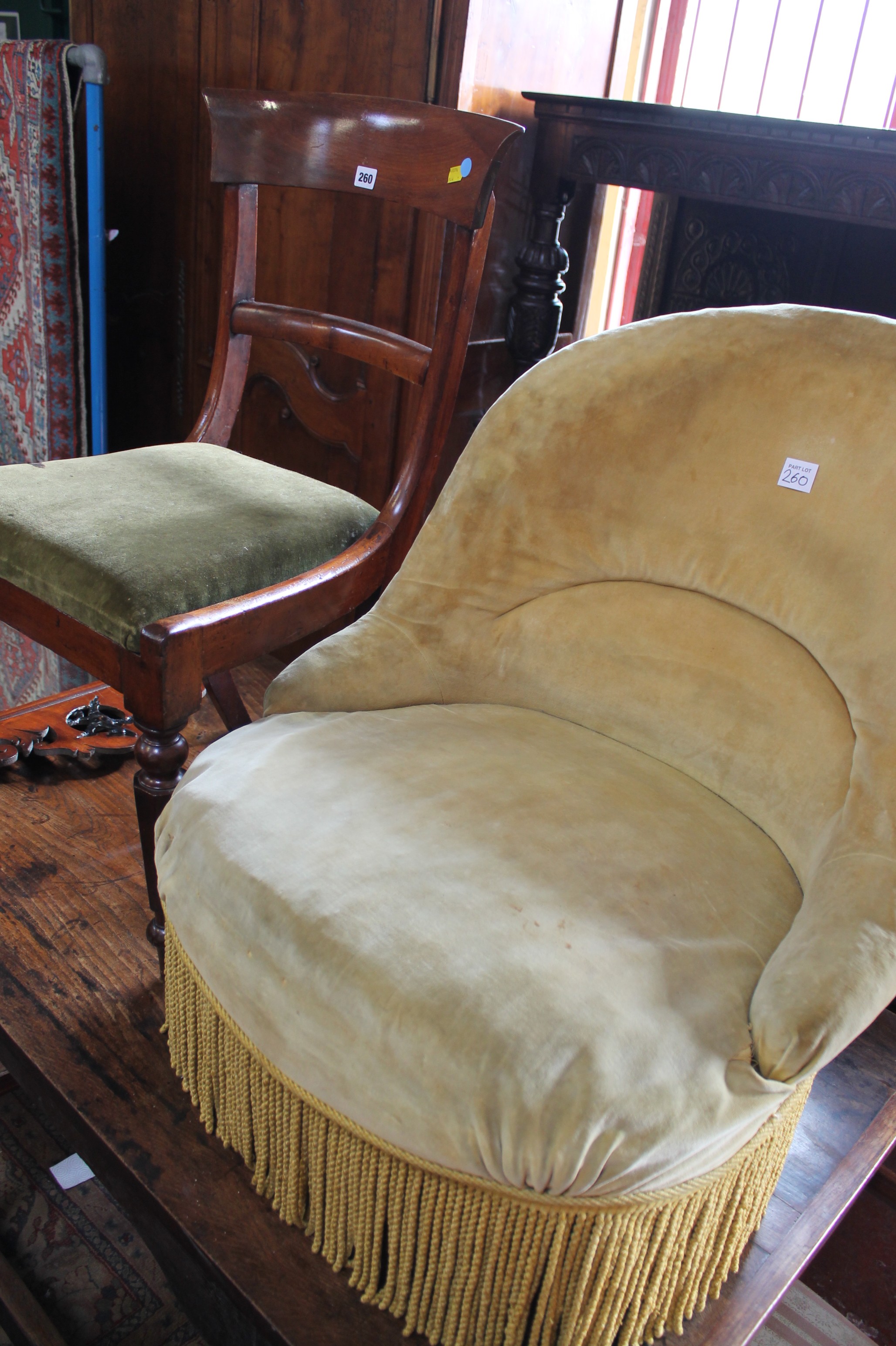 A George II style mahogany fretwork wall mirror, a bar back chair and a Victorian tub chair Best