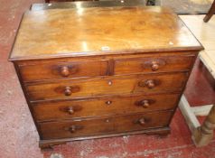 A George III mahogany chest of two short and three long drawers, on ogee bracket feet, attached