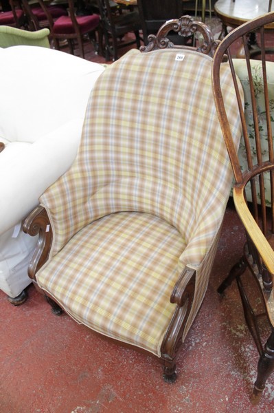 An early Victorian mahogany armchair in checked upholstery