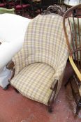 An early Victorian mahogany armchair in checked upholstery