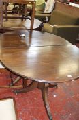 A Regency style twin pedestal dining table with two extra leaves. Best Bid