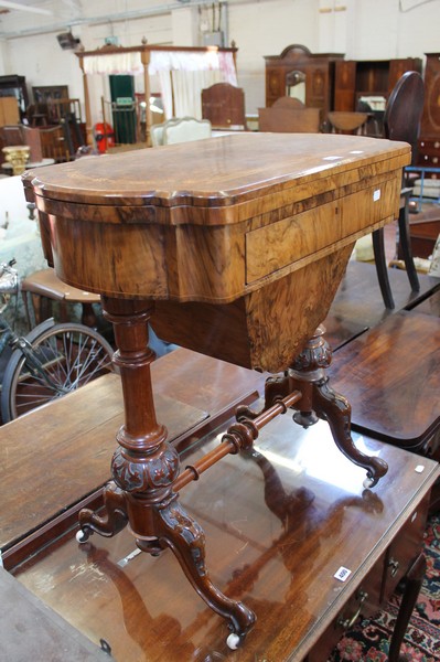 Victorian Walnut work and games table with fold over checkerboard and cribbage top.