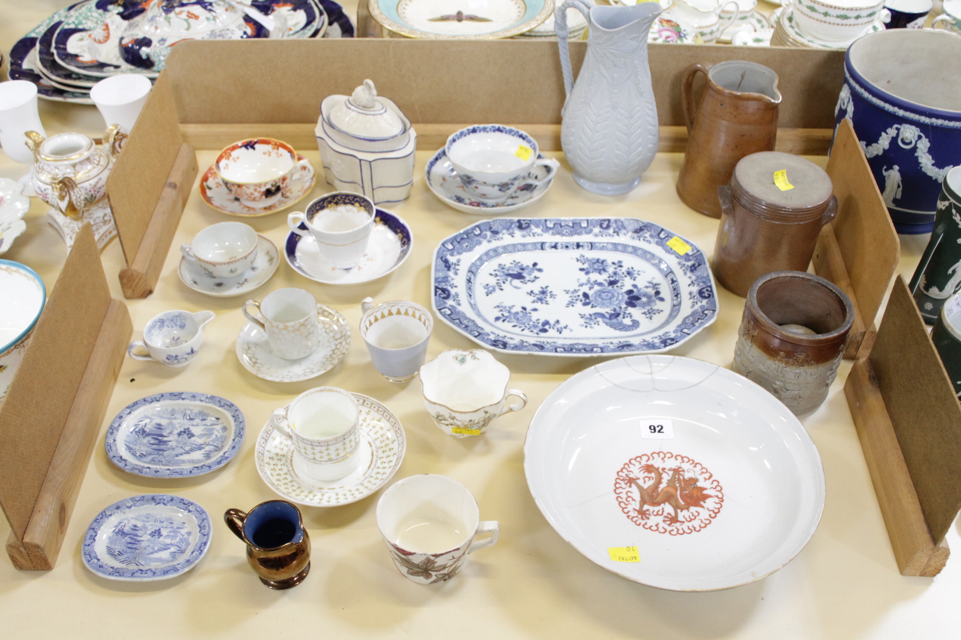 A Chinese export blue and white meat dish; 31 x 23cm, a stoneware storage jar, together with