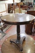 A William IV rosewood circular occasional table, circa 1835, the circular top above a turned and