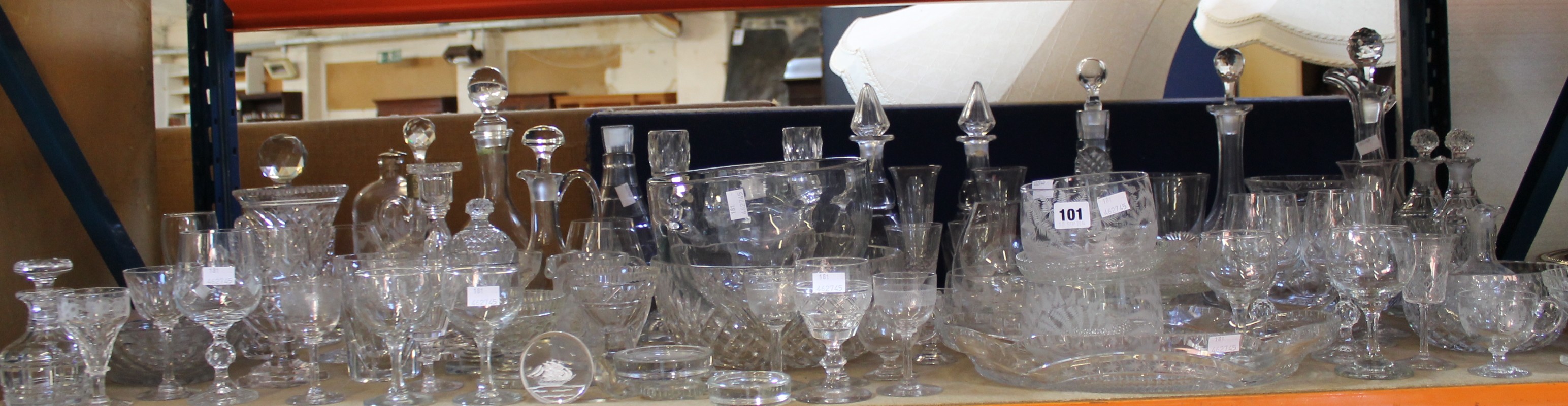 A large mixed group of clear glassware to include drinking glasses, decanters, bowl etc.