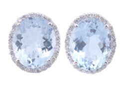 A pair of aquamarine and diamond earrings by Fabrizio Caviglia, the oval fancy cut aquamarine,