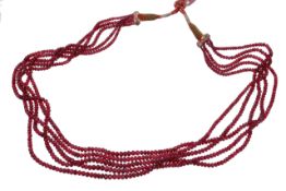 A red spinel faceted bead necklace, the five graduated rows of faceted spinel beads measuring 1.