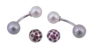 A pair of cultured pearl set cufflinks, the cufflinks with white and grey cultured pearl